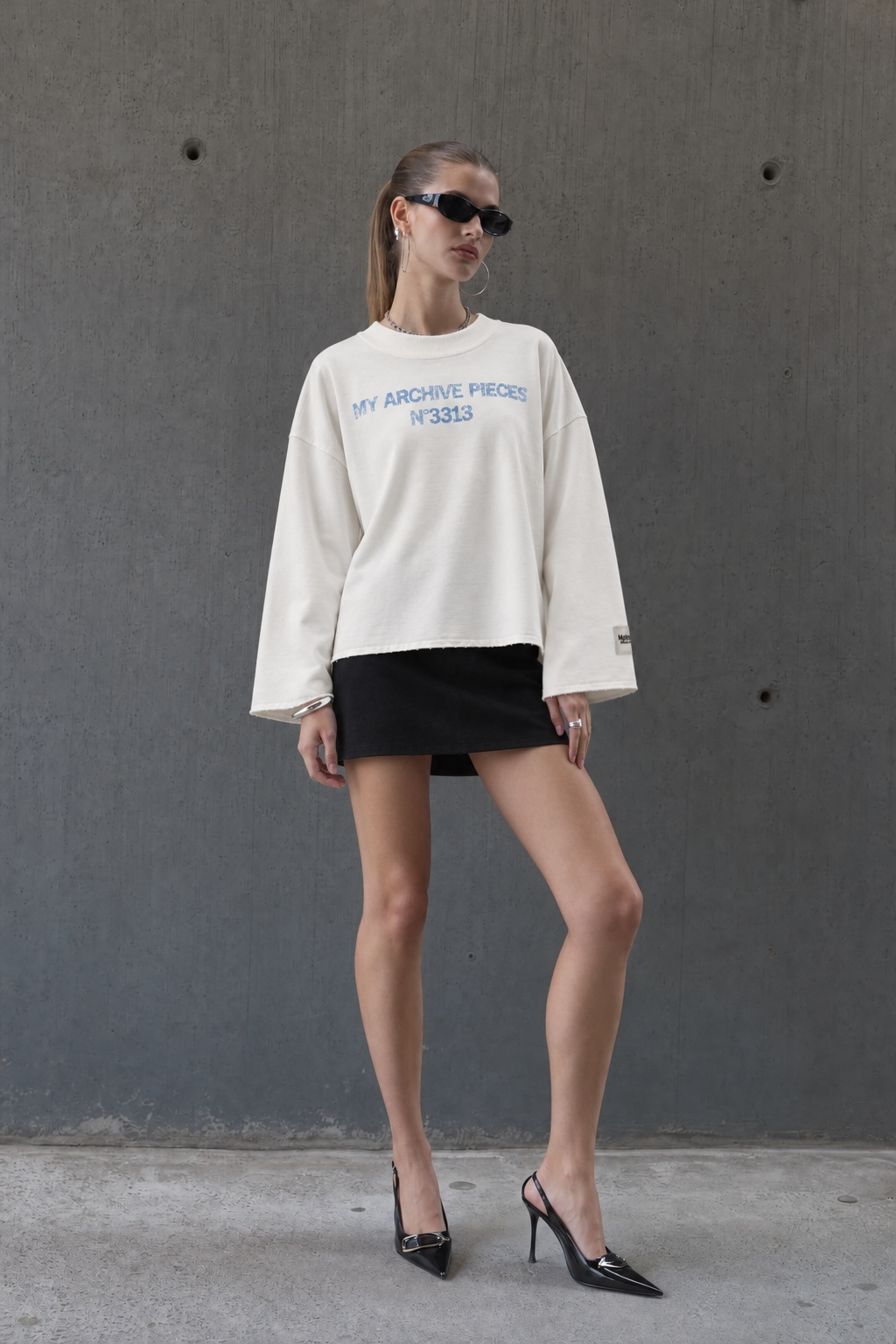 Archive Pieces Longsleeve - styled with a black mini skirt